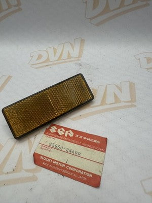 Suzuki NOS OEM Reflector 35950-24A00 Amber Black
