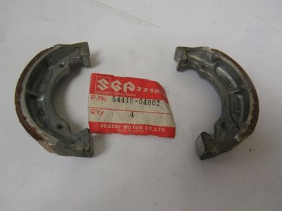 NOS SUZUKI BRAKE SHOE SET ALT50 LT50 JR50   54410-04000-04001 04002