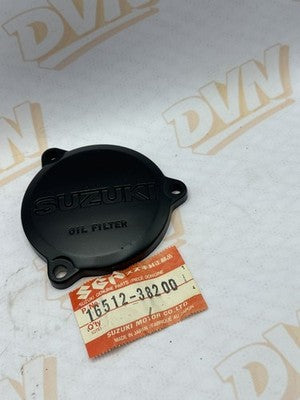 SUZUKI DR250 82 16512-38200 COVER OIL FILTER