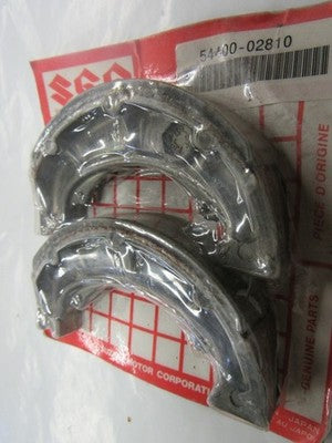 NOS NEW FRONT BRAKE SHOE FITS SUZUKI ATV QUADRUNNER LT160E 2X4 1989-2004 54400-0