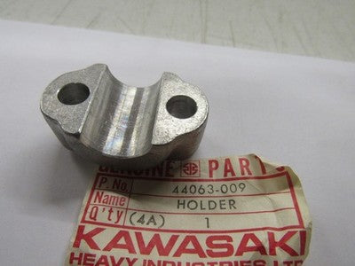Kawasaki NOS NEW 44063-009 Front Axle Holder KD KE KS KX KD125 KE125 KS125 KX125