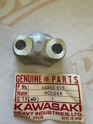 1974-1981 Kawasaki 44063-010 KZ400 KZ440 Front Axle Holder NOS