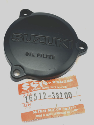 SUZUKI DR250 82 16512-38200 COVER OIL FILTER