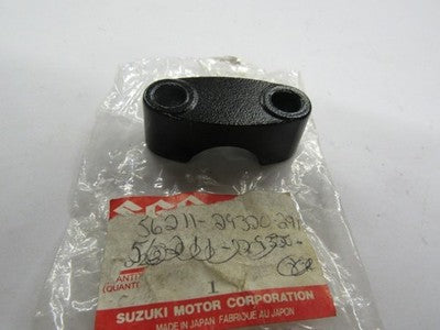 SUZUKI TS400   HANDLEBAR HOLDER CLAMP NOS  56211-29320-291