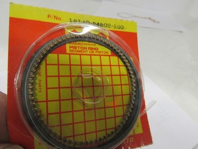 NOS Suzuki Piston Ring Set 1.0 MM OVER   1985-89 LT250 LT300 ATV 12140-24502-100