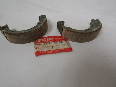 NOS SUZUKI BRAKE SHOE SET ALT50 LT50 JR50   54410-04000-04001 04002