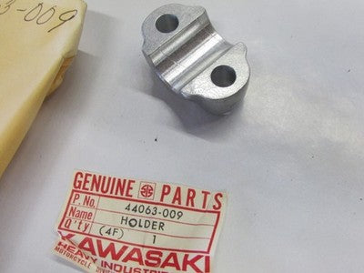 Kawasaki NOS NEW 44063-009 Front Axle Holder KD KE KS KX KD125 KE125 KS125 KX125