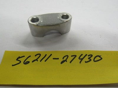 SUZUKI 1977-1978  HANDLEBAR HOLDER CLAMP NOS  56211-27430