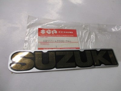 NOS Suzuki 1985-1986 LT250 Fuel Tank Emblem 68111-43500-94L