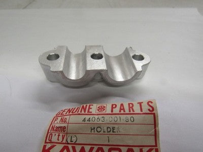 Kawasaki NOS NEW 44063-001-80 Buff Front Axle Holder F9 350