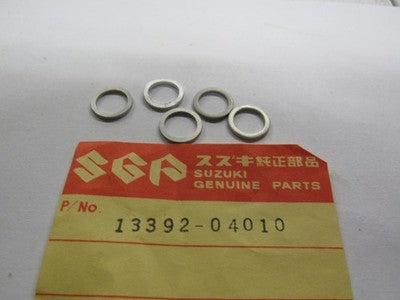 NOS OEM Suzuki Valv e Seat Gasket 1972-1986 JR50 GT380 GT550 Indy 13392-04010