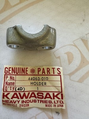 1974-1981 Kawasaki 44063-010 KZ400 KZ440 Front Axle Holder NOS