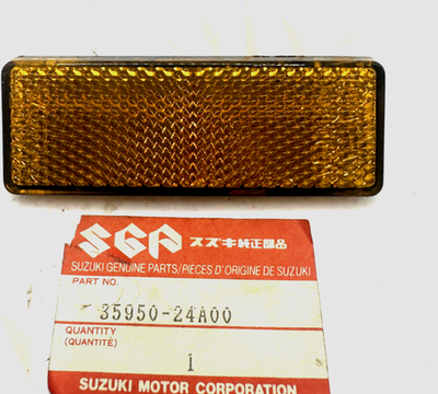 Suzuki NOS OEM Reflector 35950-24A00 Amber Black