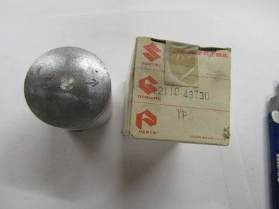 NOS Suzuki OEM Piston 1979-1982 TS125 TC125 1.0MM OVERSIZE   12110-48730