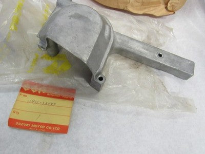 Suzuki GT380 nos oil pump cover 1972-1977 11411-33000