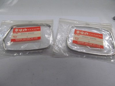 NOS OEM FACTORY SUZUKI GS650 GS1100 GS450 XN85 TURN SIGNAL LAMP RIM 35611-49230