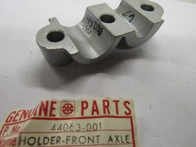 Kawasaki NOS NEW 44063-001-80 Buff Front Axle Holder F9 350