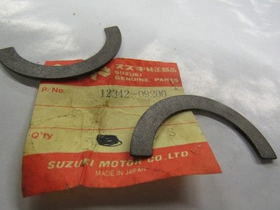 Suzuki S-32-2    Nos oem Crank shaft oil positioner  p.n  12342-09200