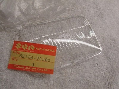 NEW GENUINE SUZUKI 35124-32500 LENS, HEADLAMP DR370 DS100 DS185