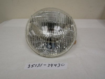 SUZUKI GS650E GS650G GS650GL nos headlamp unit 1981-1983    35121-34430