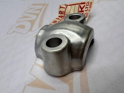 NOS OEM KAWASAKI FORK AXLE HOLDER F11     44063-005