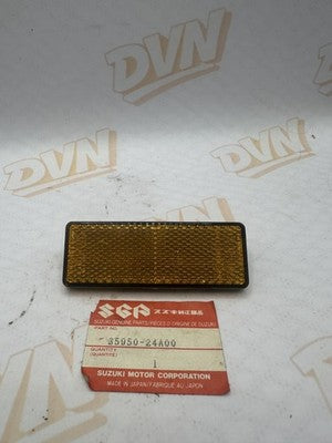 Suzuki NOS OEM Reflector 35950-24A00 Amber Black