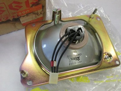 SUZUKI XX400 snowmobole nos headlight assy   35100-97320  sm11 sm21 sm30 sm40