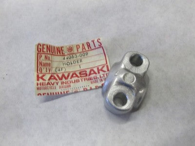 Kawasaki NOS NEW 44063-009 Front Axle Holder KD KE KS KX KD125 KE125 KS125 KX125