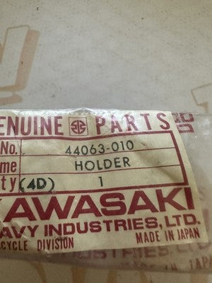 1974-1981 Kawasaki 44063-010 KZ400 KZ440 Front Axle Holder NOS