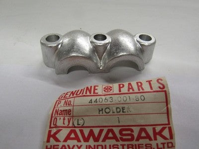 Kawasaki NOS NEW 44063-001-80 Buff Front Axle Holder F9 350