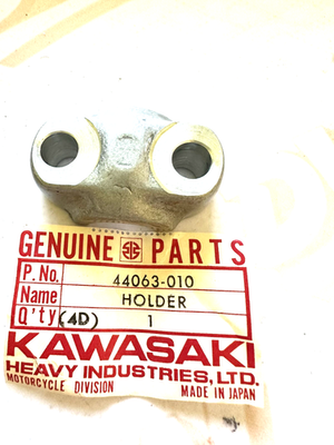 1974-1981 Kawasaki 44063-010 KZ400 KZ440 Front Axle Holder NOS