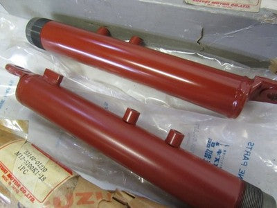 SUZUKI M12 M15  RIGHT AND LEFT  HAND OUTER  FORK LOWER LEG NOS!