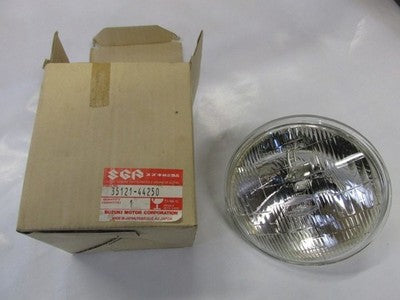Suzuki 1983-1992 GN125 NOS HEADLIGHT  35121-44250
