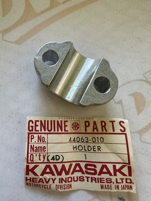 1974-1981 Kawasaki 44063-010 KZ400 KZ440 Front Axle Holder NOS