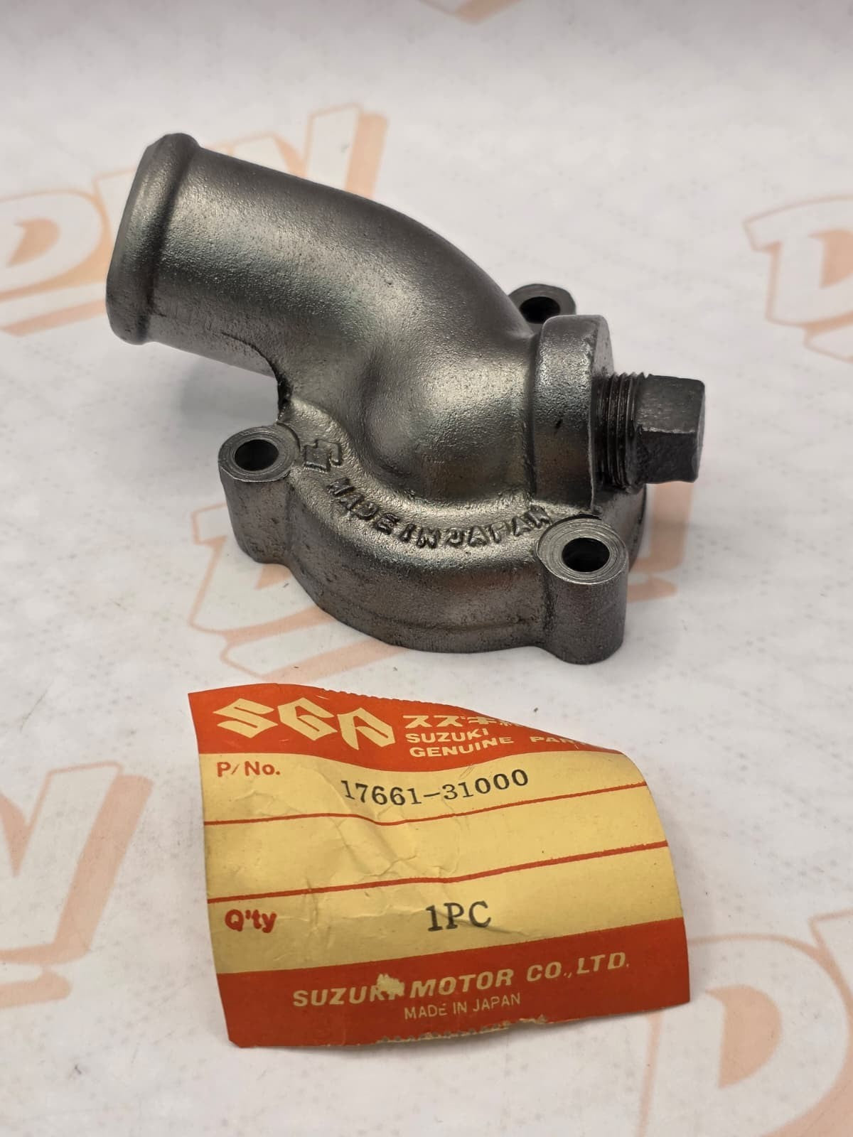 1972-1977 SUZUKI GT 750 OEM THERMOSTAT COVER 17661-31000
