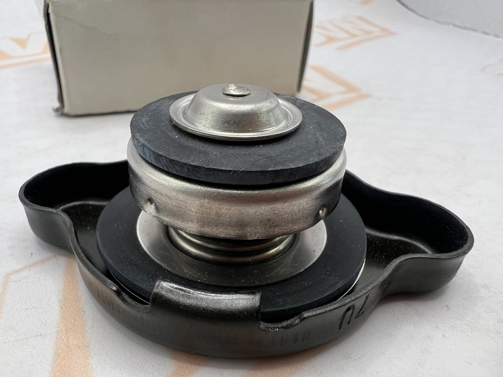 Suzuki NOS OEM radiator cap part numbers 17730-08J00 and 17730-12C20