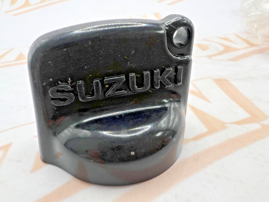 NOS Suzuki LT-A450 LT-A400 DR-Z50 ATV Key Cover Cap 37142-19B00 OEM