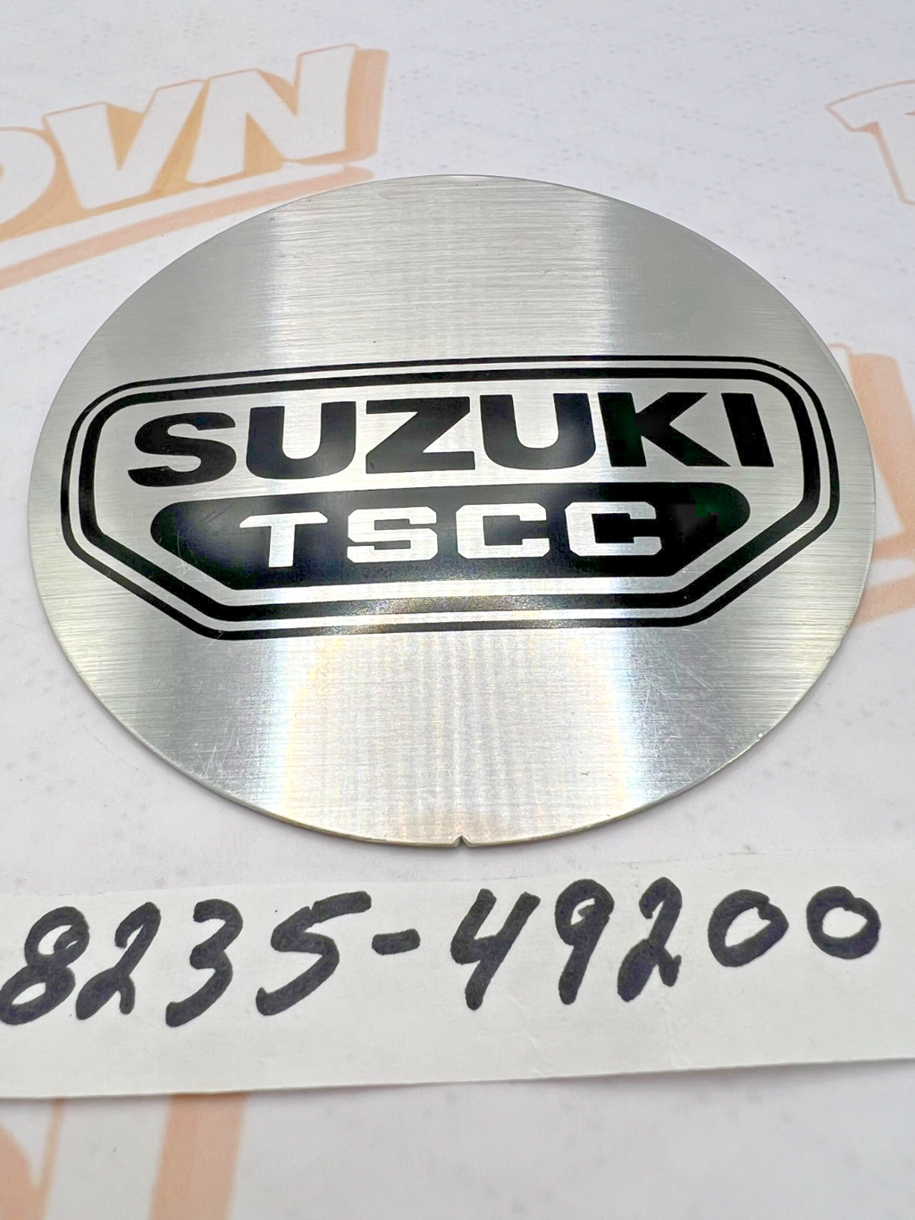 Suzuki EMBLEM CONTACT 68235-49200 OEM NEW