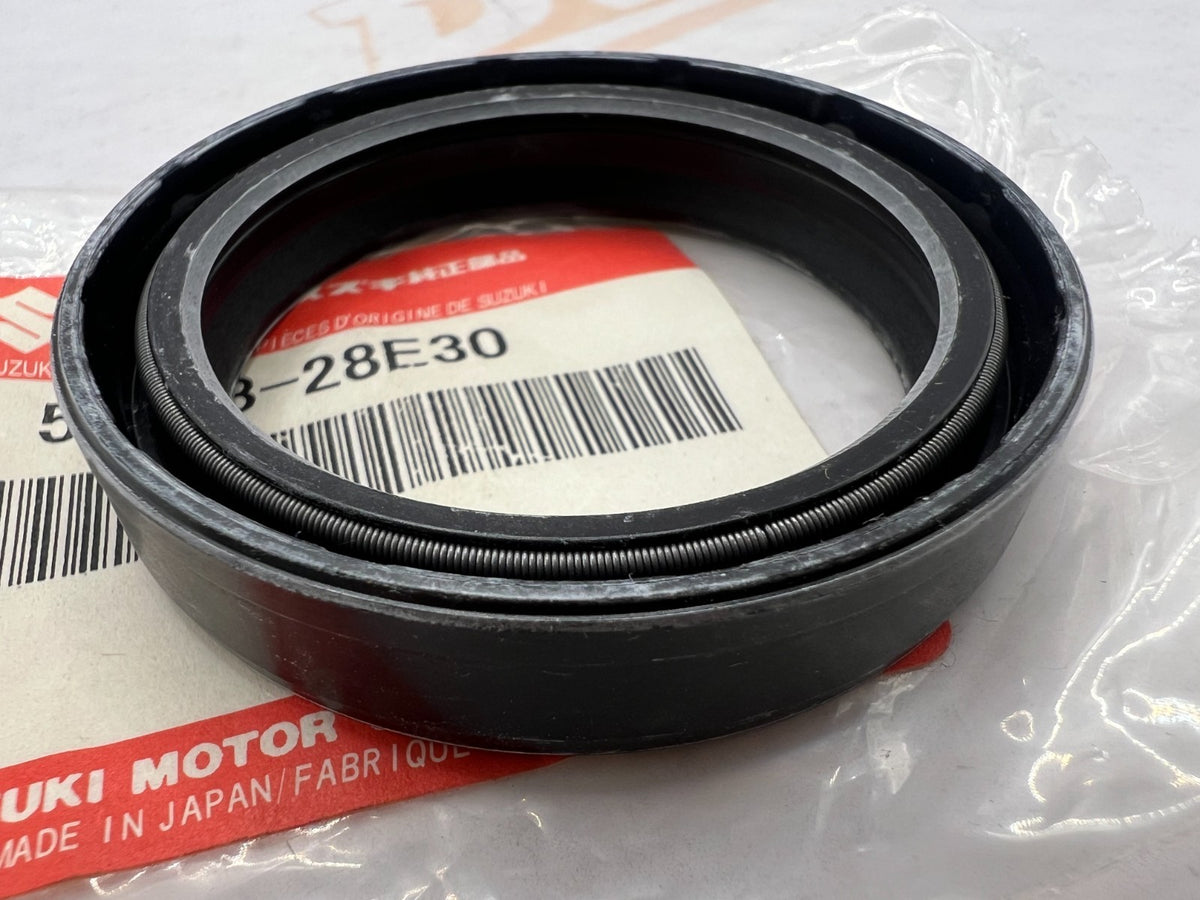 SUZUKI- 51153-28E30- FRONT FORK SEAL 1989-98 RM 125,250  NOS