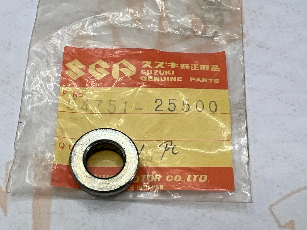 NOS OEM SUZUKI TC100/125/185, TS100/125/185 L/H FRONT WHEEL SPACER 54751-25500