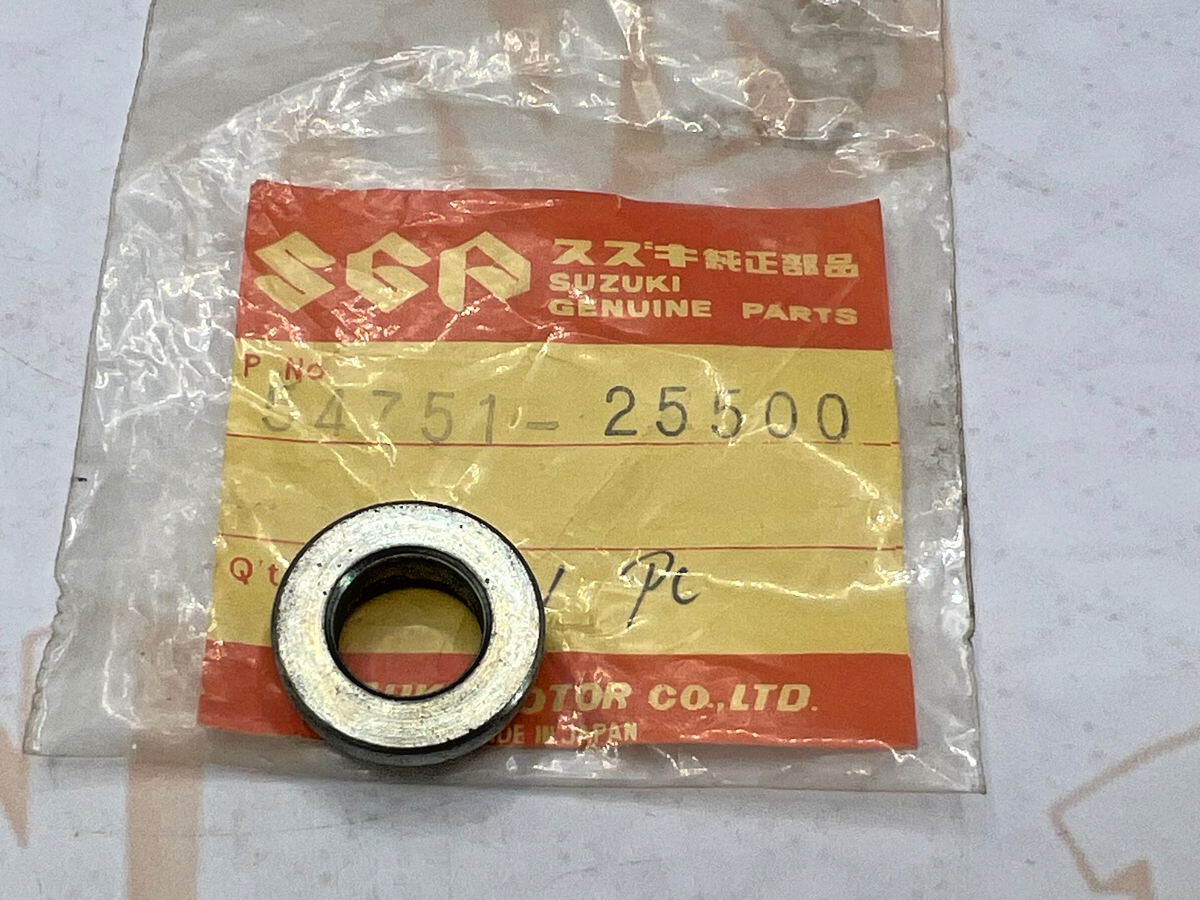 NOS OEM SUZUKI TC100/125/185, TS100/125/185 L/H FRONT WHEEL SPACER 54751-25500
