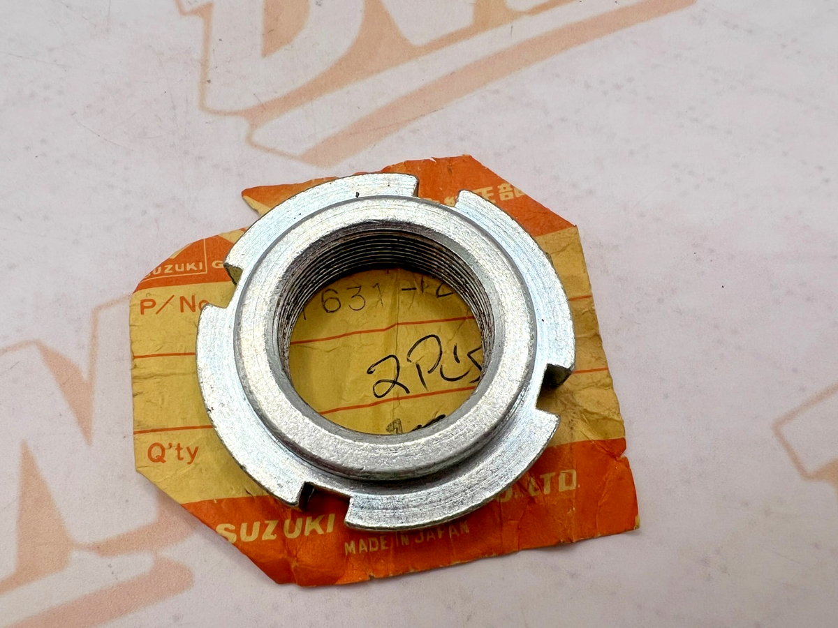 NOS OEM Suzuki Steering Stem Nut 1971-2000 TS125 GS500 GS750 51631-28000