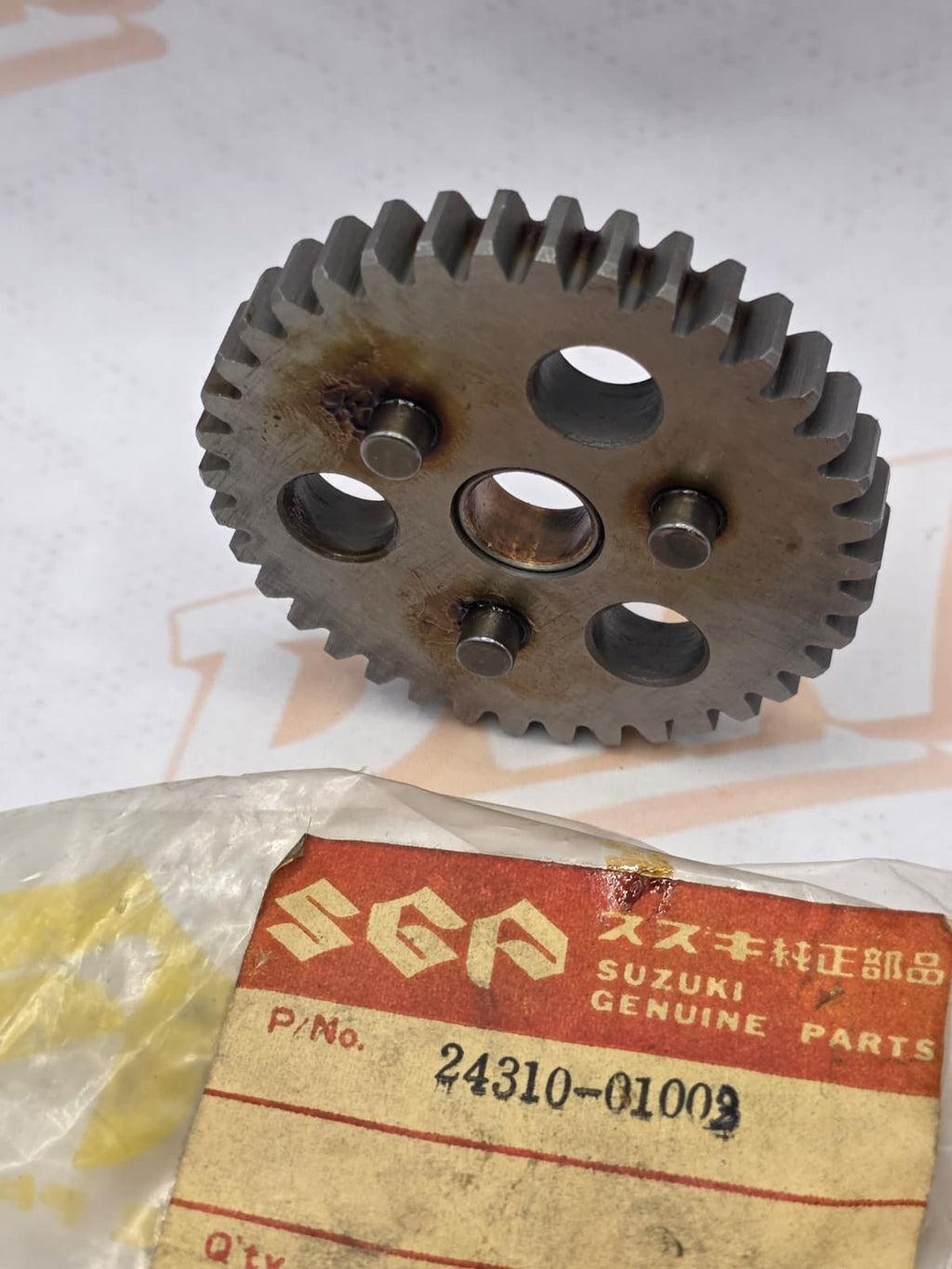 NOS GENUINE SUZUKI LOW GEAR 24310-01003 24310-01002 NEW OEM FACTORY ORIGINAL