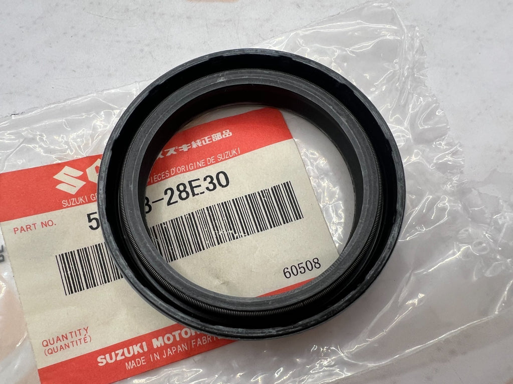 SUZUKI- 51153-28E30- FRONT FORK SEAL 1989-98 RM 125,250  NOS