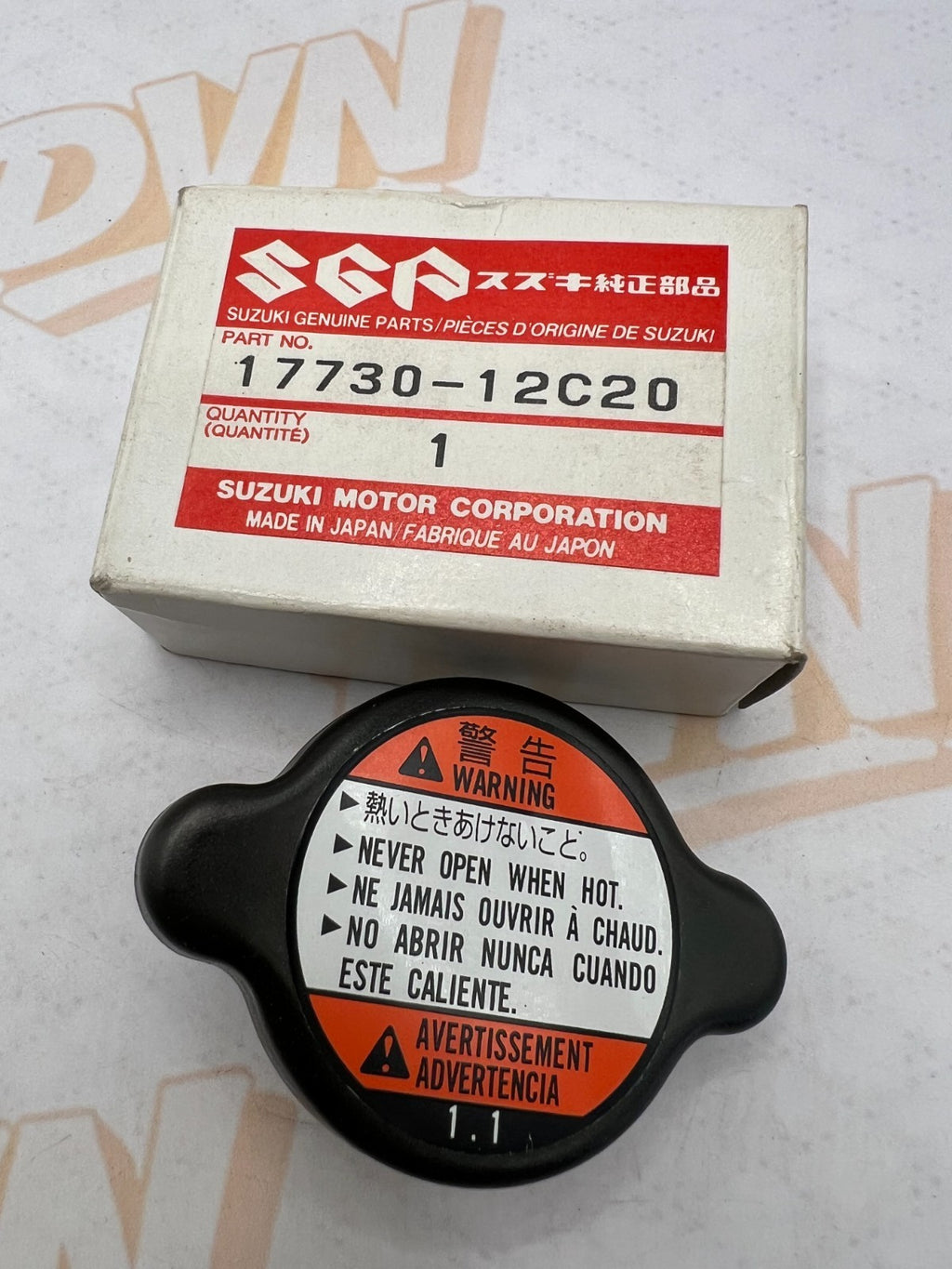 Suzuki NOS OEM radiator cap part numbers 17730-08J00 and 17730-12C20