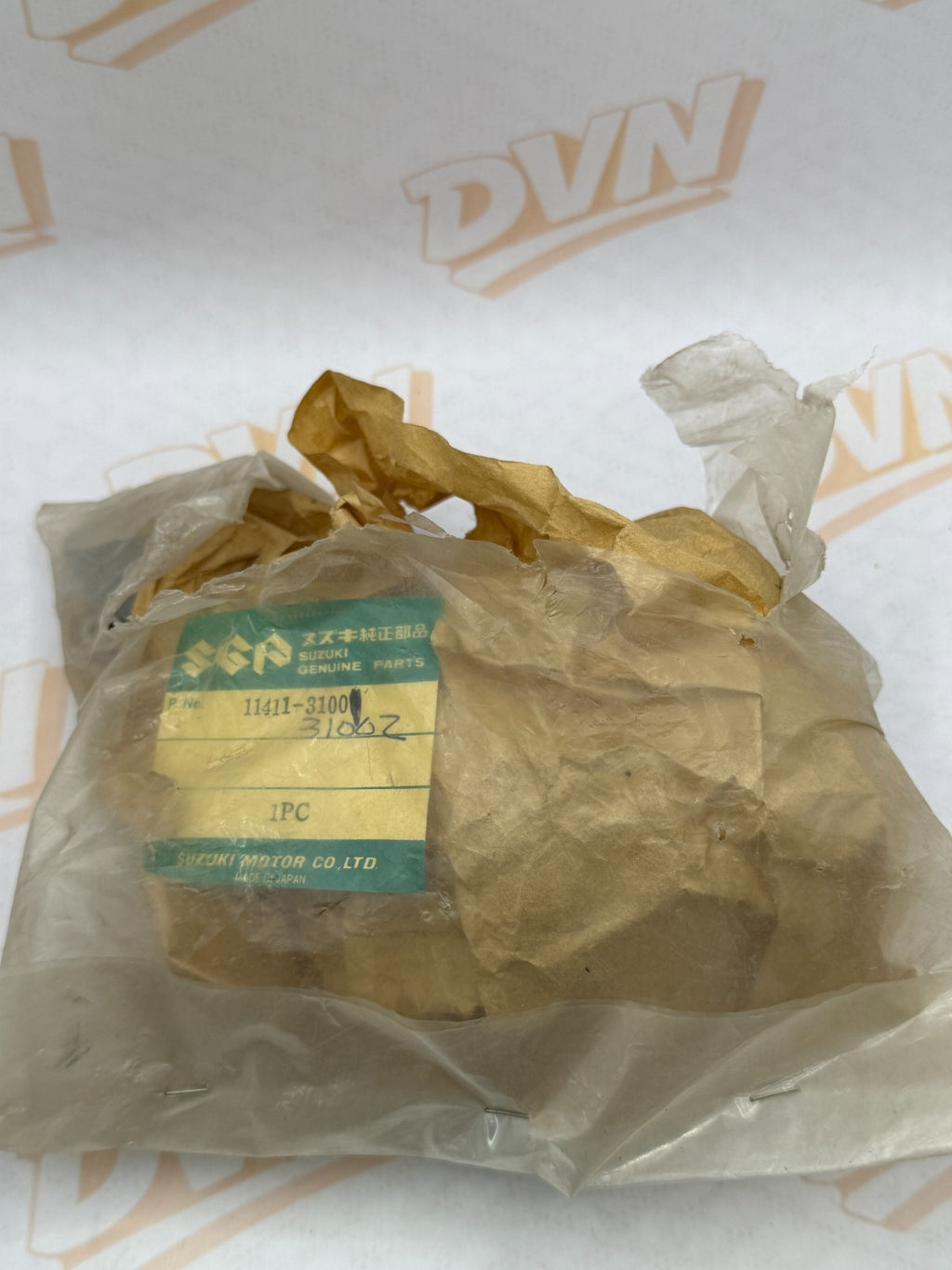 NOS Suzuki GT750 Engine Oil Pump Cover  1972- 1977 11411-31002