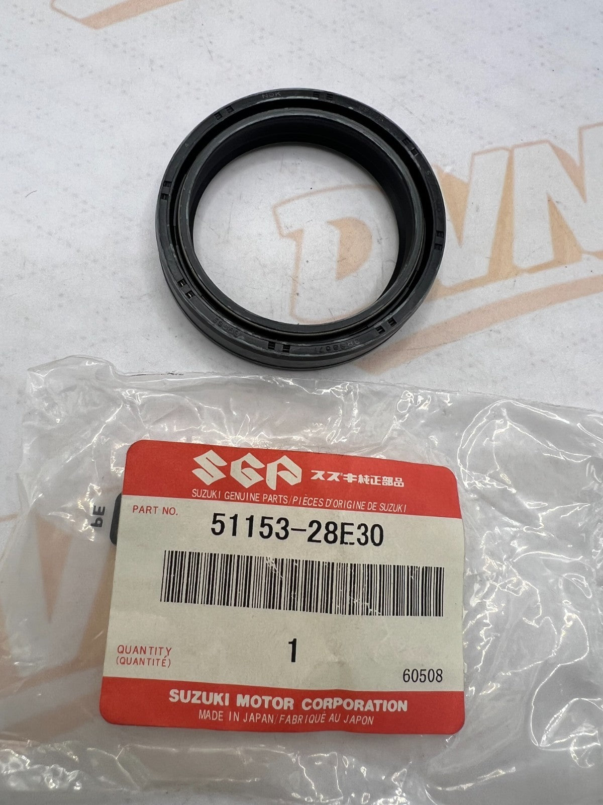 SUZUKI- 51153-28E30- FRONT FORK SEAL 1989-98 RM 125,250  NOS