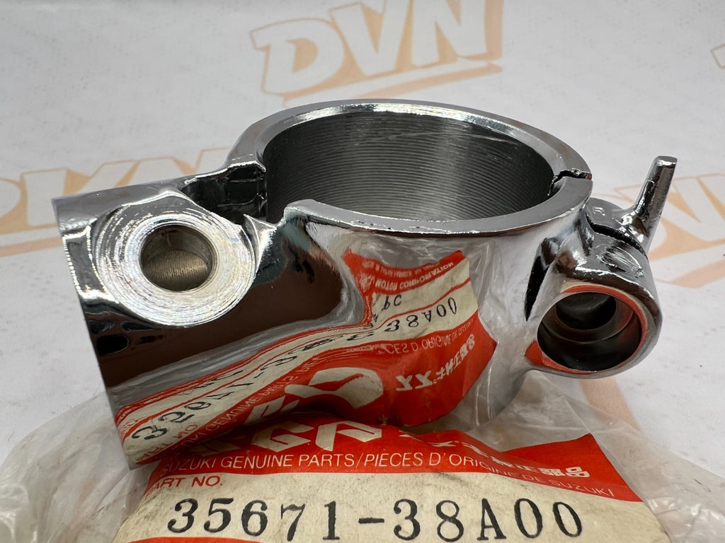 NOS OEM BRACKET,FRONT TURN SIGNAL Suzuki - 35671-38A00