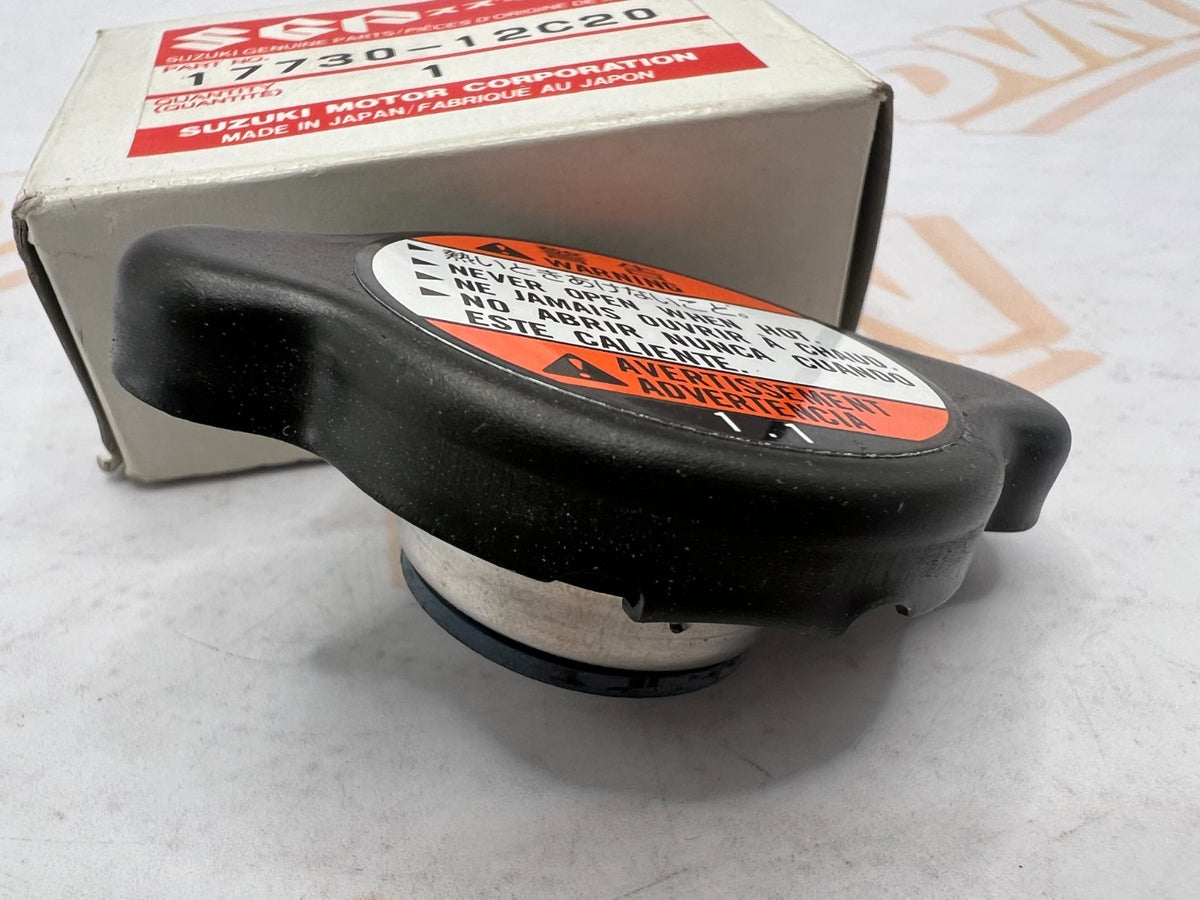 Suzuki NOS OEM radiator cap part numbers 17730-08J00 and 17730-12C20