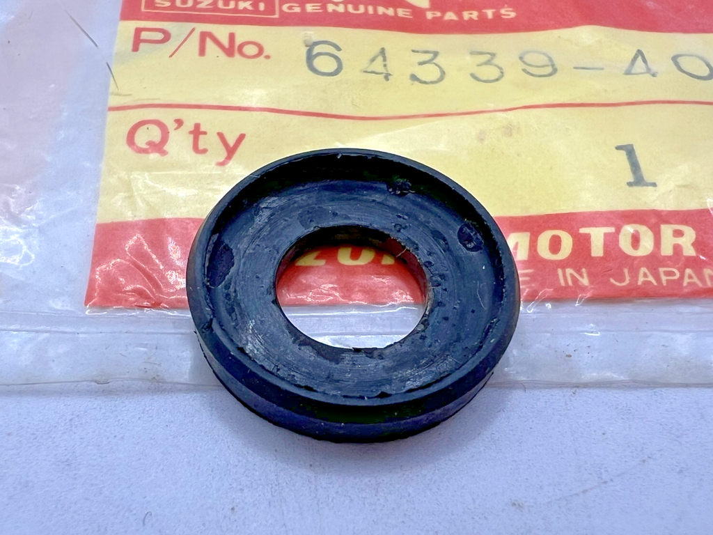 SUZUKI DR400 RM125 RM250 RM400 RS175 DUST SEAL TORQUE 64339-40401 NOS OEM